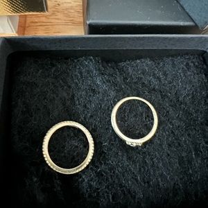 2 rings. Size 7. Hand of Hamasa and band with stones